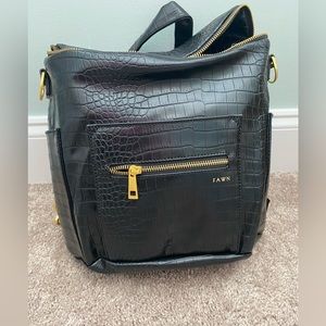 Never used. Fawn mini backpack in black croc.